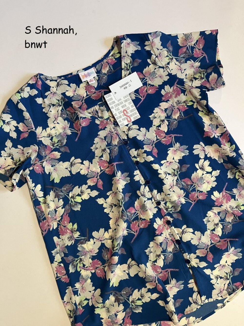 Small Lularoe Shannah button down top, blue with pink & white flowers